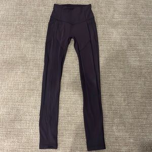 Dark purple Lululemon leggings with pockets